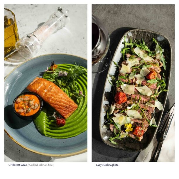 Plating of grilled salmon fillet with puree and sliced easy steak tagliata main dishes at Vogue Boat Restaurant Hungary