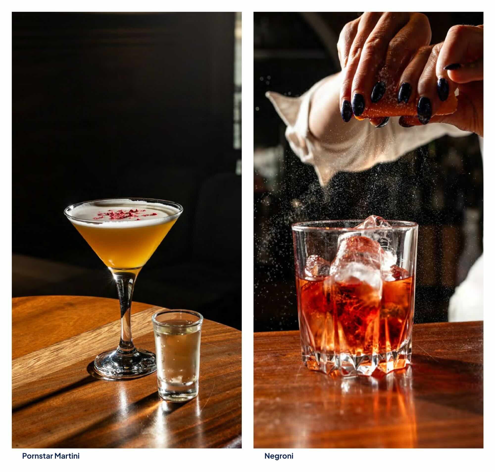 Elegant Pornstar Martini cocktail topped with rose petals, served with a side shot of prosecco at the bar of Vogue Boat Restaurant Budapest. Classic red Negroni cocktail over ice, flavored with freshly expressed orange peel oils at Vogue Boat Restaurant.